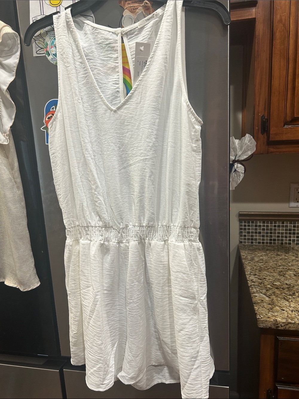 Timing White Sleeveless V-Neck Romper with Elastic Waist